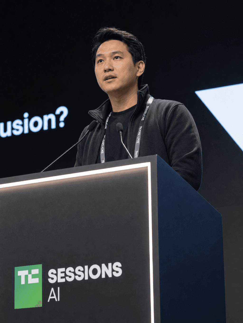 Founder speaking at a TechCrunch Sessions AI podium